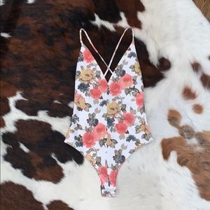 Floral cross back bodysuit!